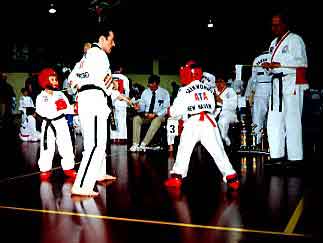 Judging a student at New England tournament (1997)